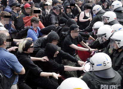 onfrontation between riot cops and activists in Wuppertal.